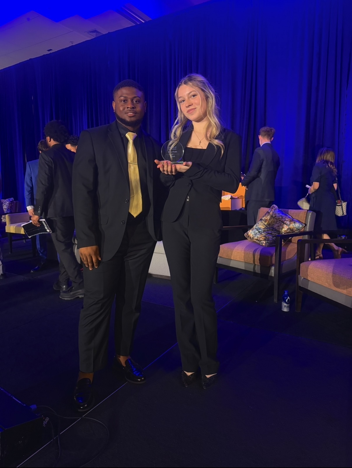 Envision Marketing team members receiving an industry award at a formal gala